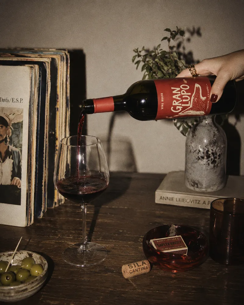 girl pouring wine